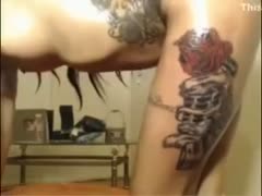 A Saint Louis sexy woman with several tattoos flaunts her curves.
